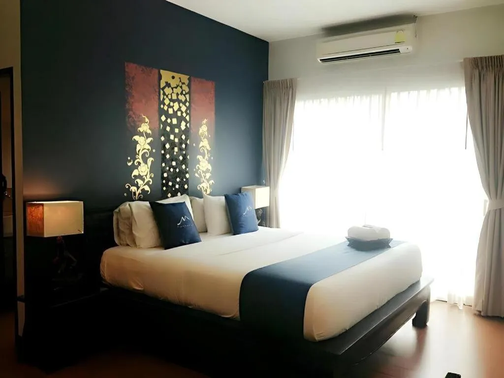 Bed in Maytara Hotel