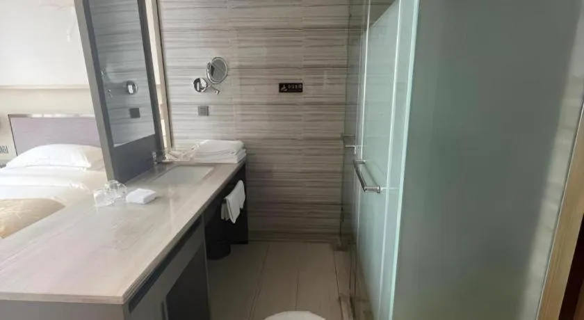 Bed in Zhangjiagang Guomao Hotel