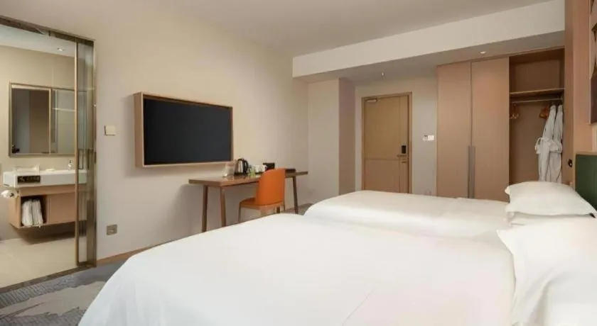 Bed in Zhangjiagang Guomao Hotel