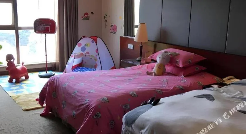 Bed in Zhangjiagang Guomao Hotel