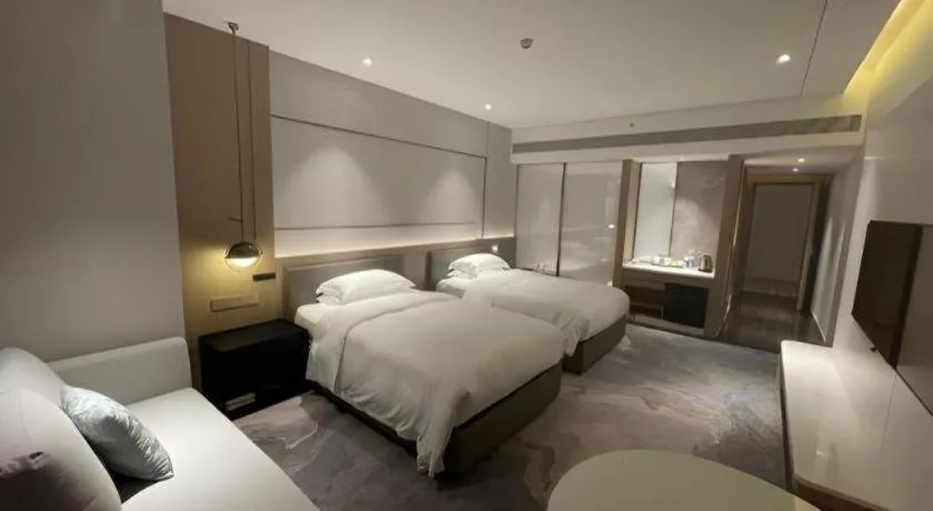 Bed in Zhangjiagang Guomao Hotel