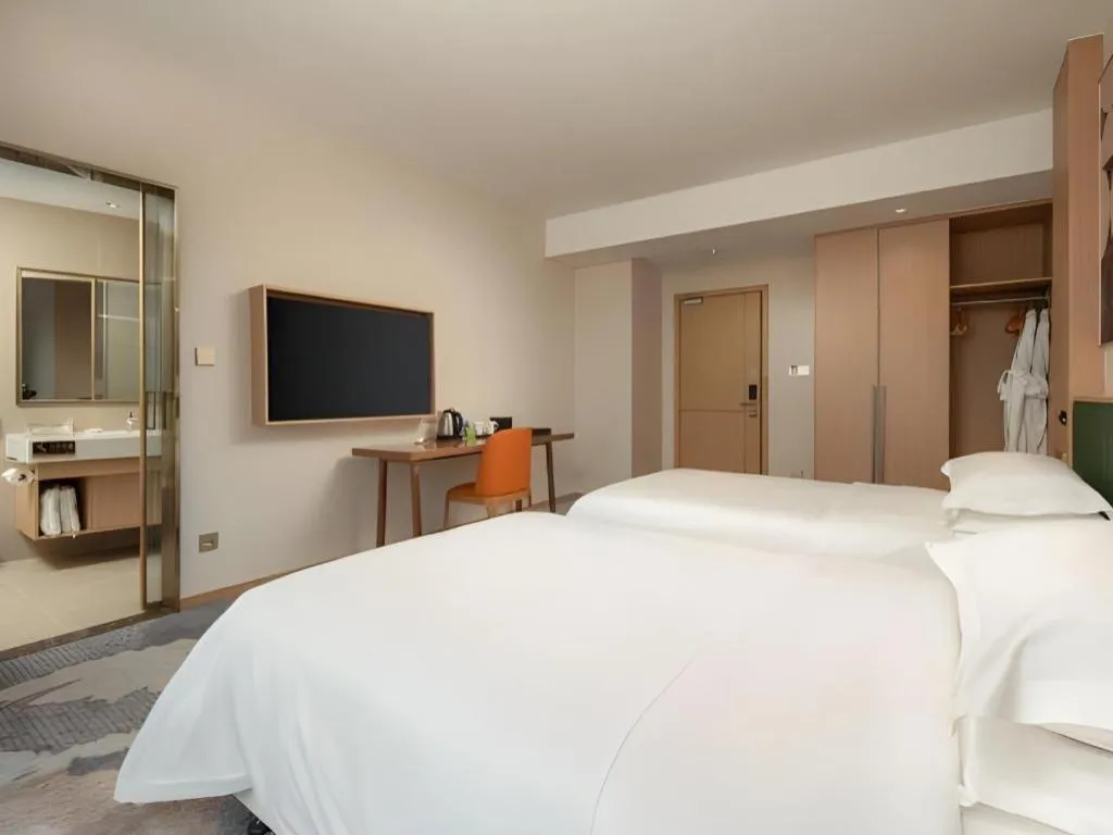 Bed in Zhangjiagang Guomao Hotel