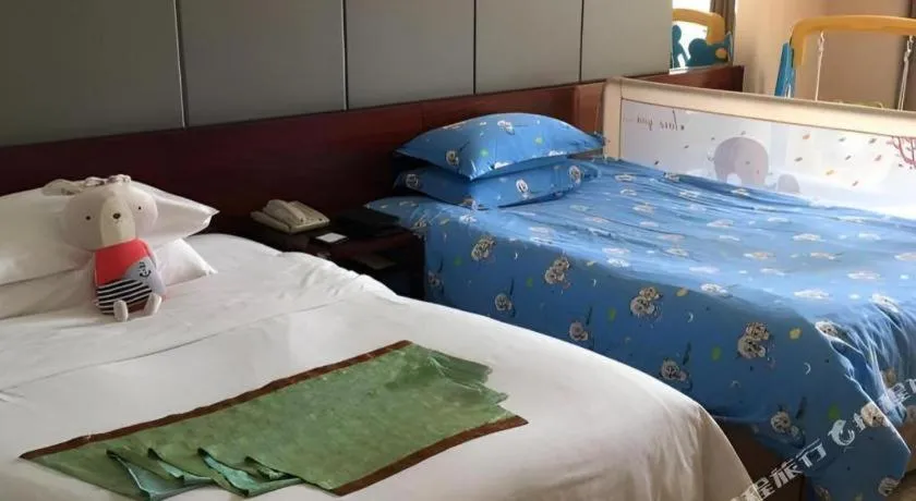 Bed in Zhangjiagang Guomao Hotel