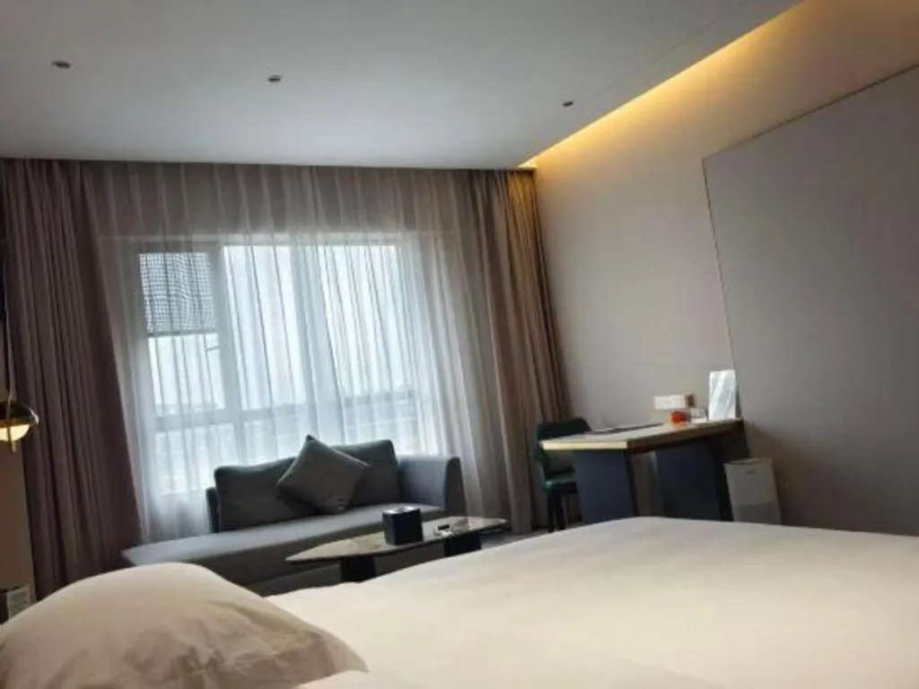 Bed in Zhangjiagang Guomao Hotel