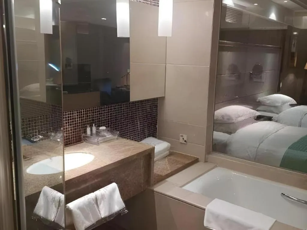 Bed in Zhangjiagang Guomao Hotel