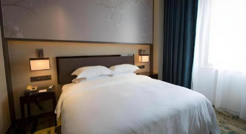 Bed in Zhangjiagang Guomao Hotel