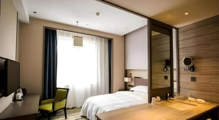 Bed in Zhangjiagang Guomao Hotel