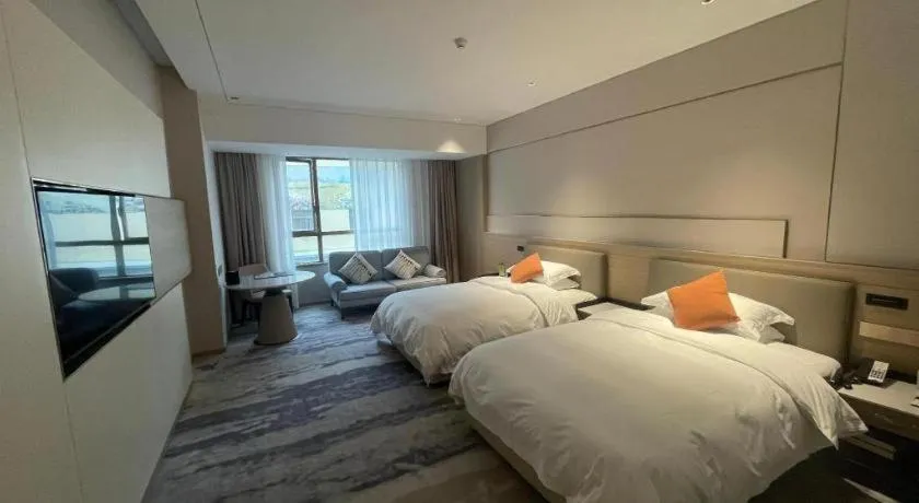 Bed in Zhangjiagang Guomao Hotel