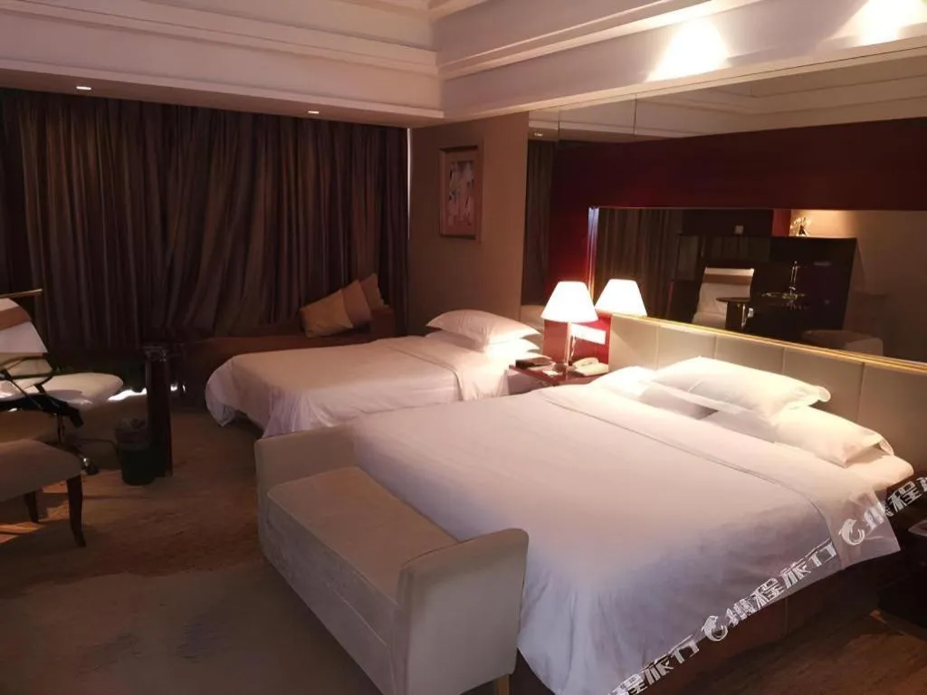 Bed in Zhangjiagang Guomao Hotel