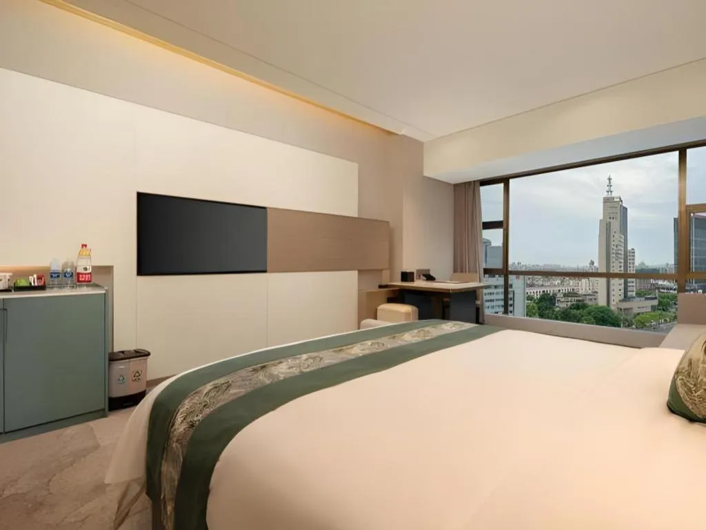Bed in Zhangjiagang Guomao Hotel