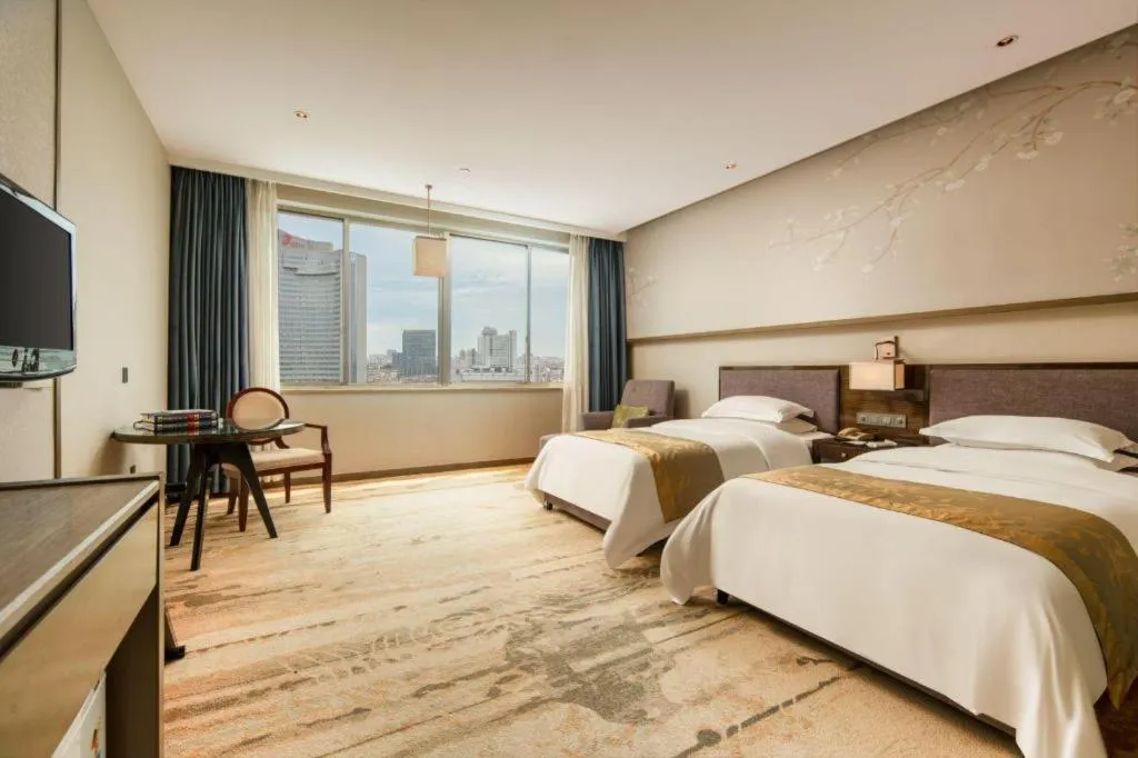 Bed in Zhangjiagang Guomao Hotel