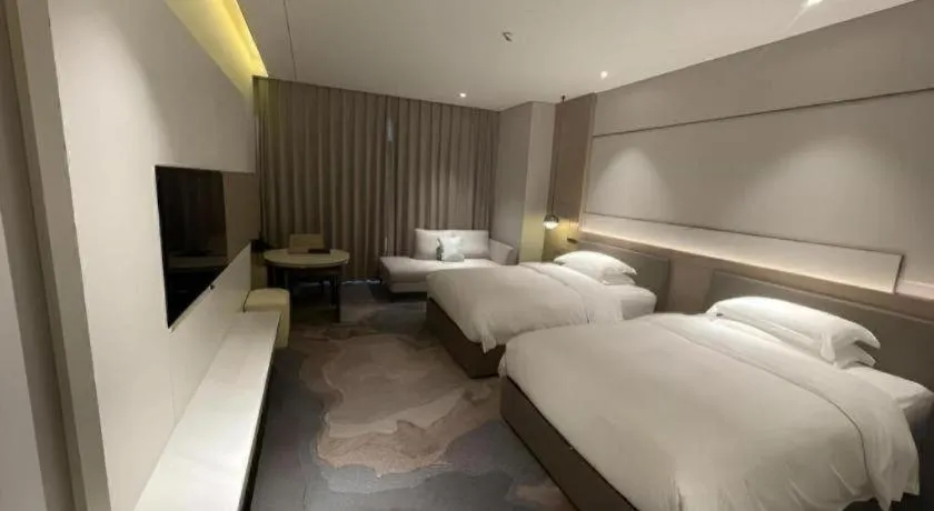 Bed in Zhangjiagang Guomao Hotel