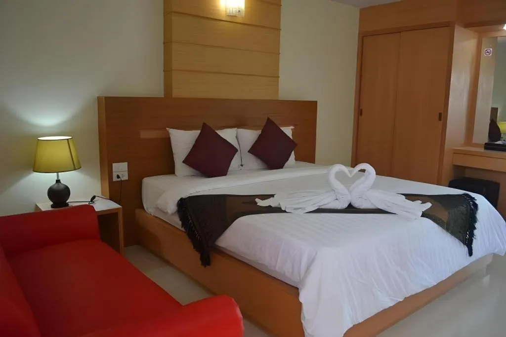 Bed in Amnauysuk Hotel