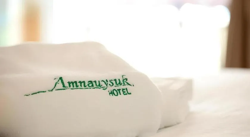 Bed in Amnauysuk Hotel