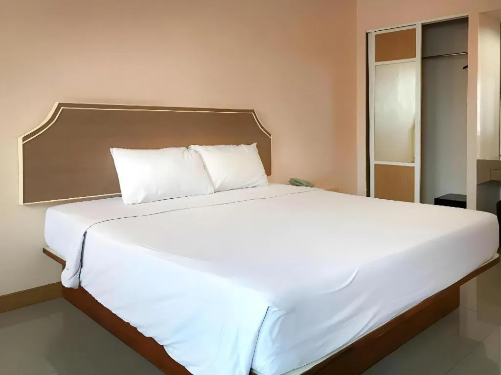 Bed in J Two S Pratunam Hotel