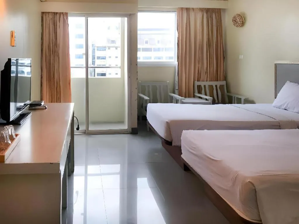 Bed in J Two S Pratunam Hotel