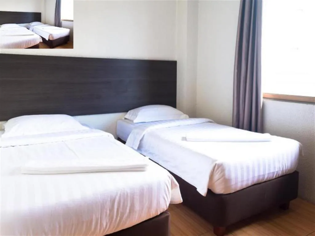 Bed in City Center Hotel