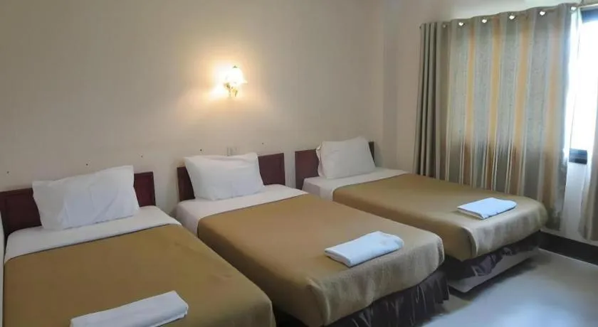 Bed in Chaleunehoung Hotel