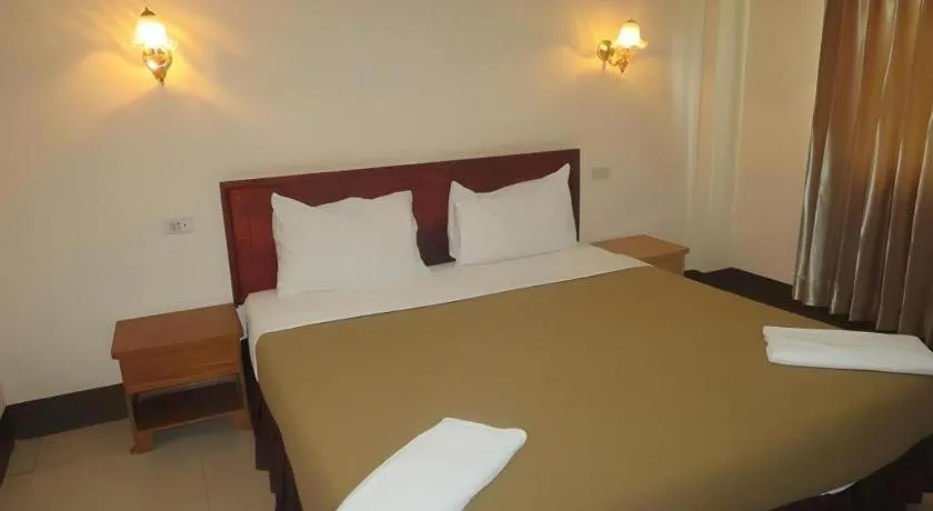 Bed in Chaleunehoung Hotel