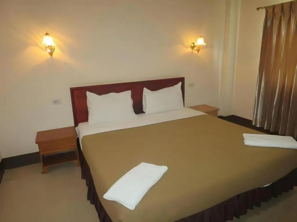 Bed in Chaleunehoung Hotel