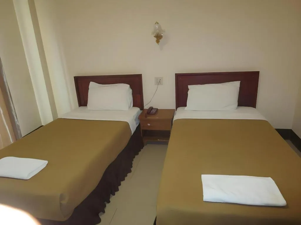 Bed in Chaleunehoung Hotel