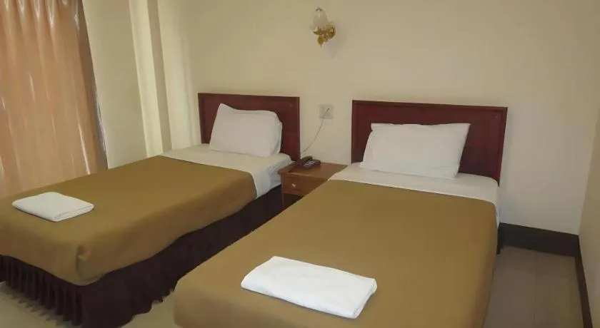 Bed in Chaleunehoung Hotel