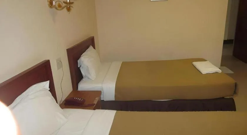 Bed in Chaleunehoung Hotel