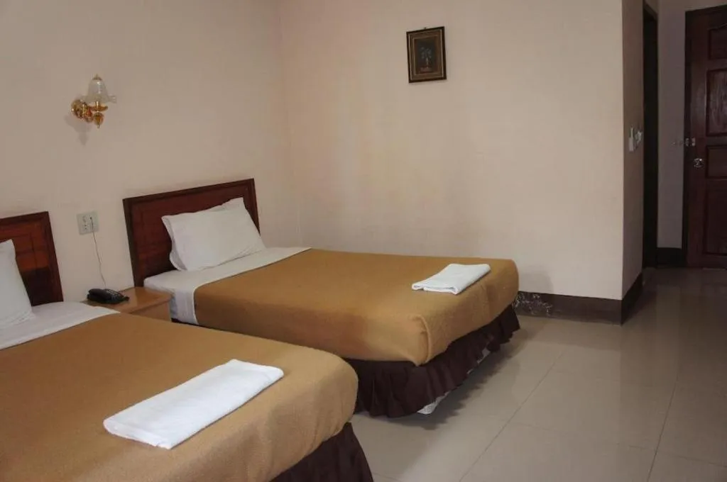 Bed in Chaleunehoung Hotel