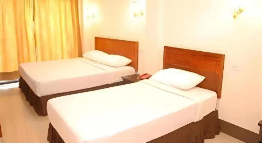 Bed in Chaleunehoung Hotel