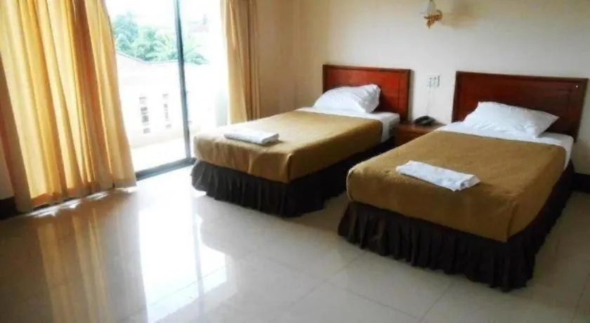 Bed in Chaleunehoung Hotel