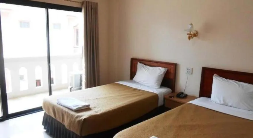 Bed in Chaleunehoung Hotel