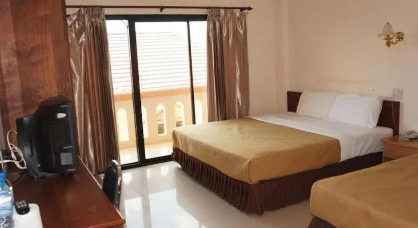 Bed in Chaleunehoung Hotel