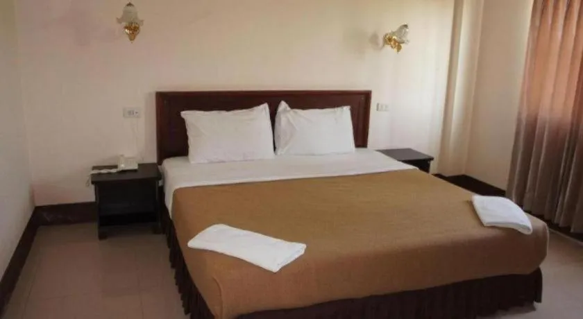 Bed in Chaleunehoung Hotel