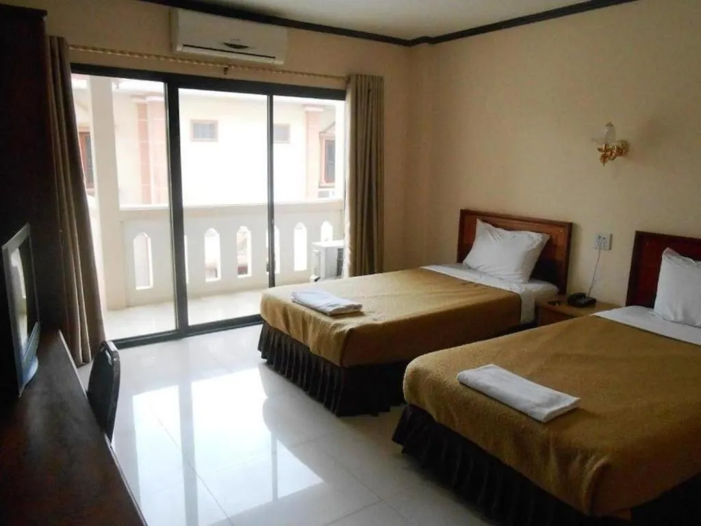 Bed in Chaleunehoung Hotel