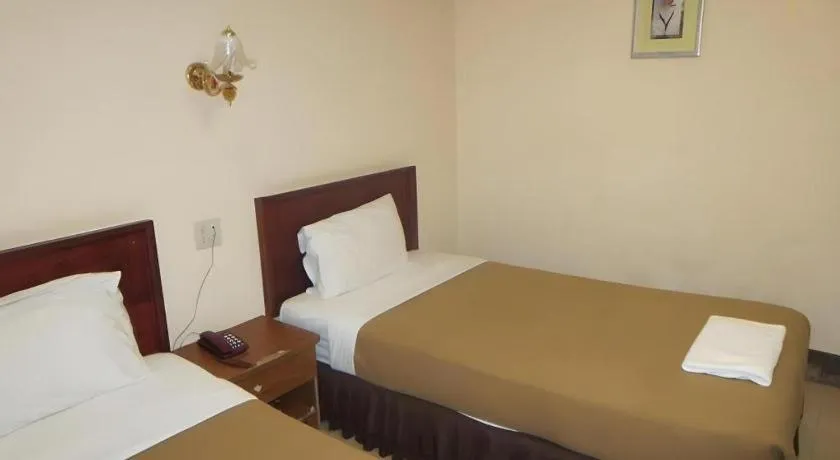 Bed in Chaleunehoung Hotel