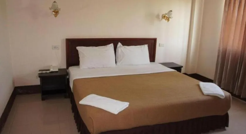 Bed in Chaleunehoung Hotel