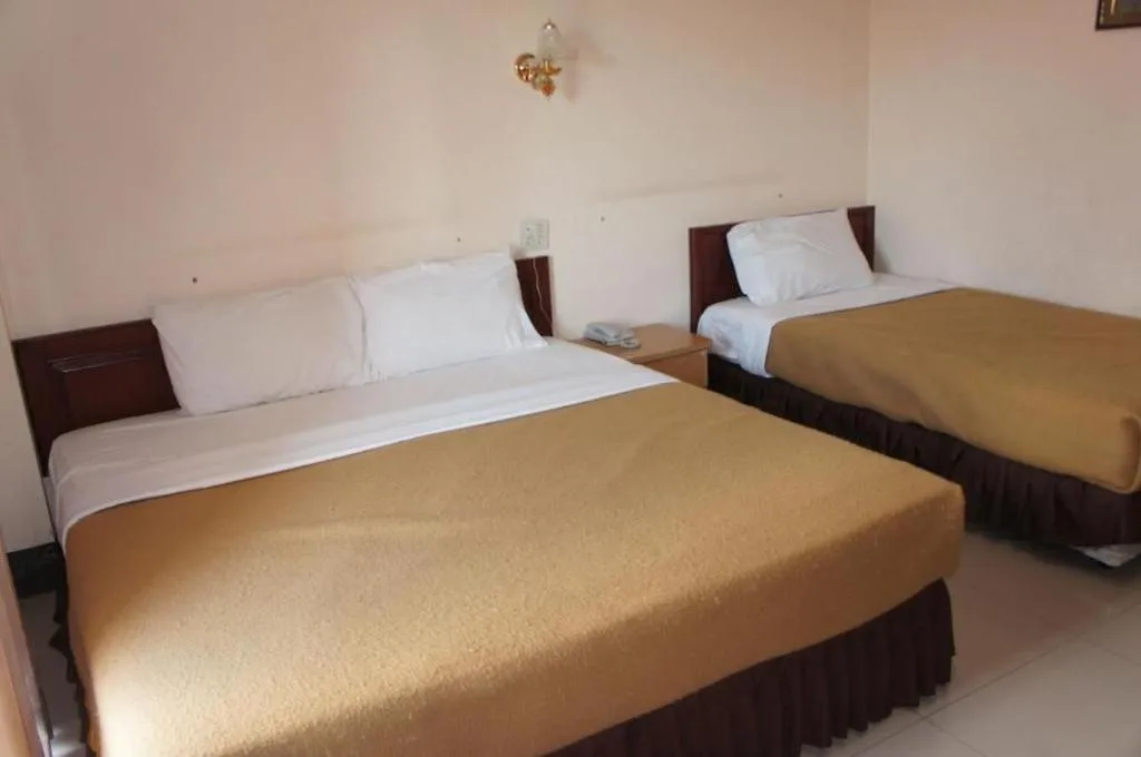 Bed in Chaleunehoung Hotel