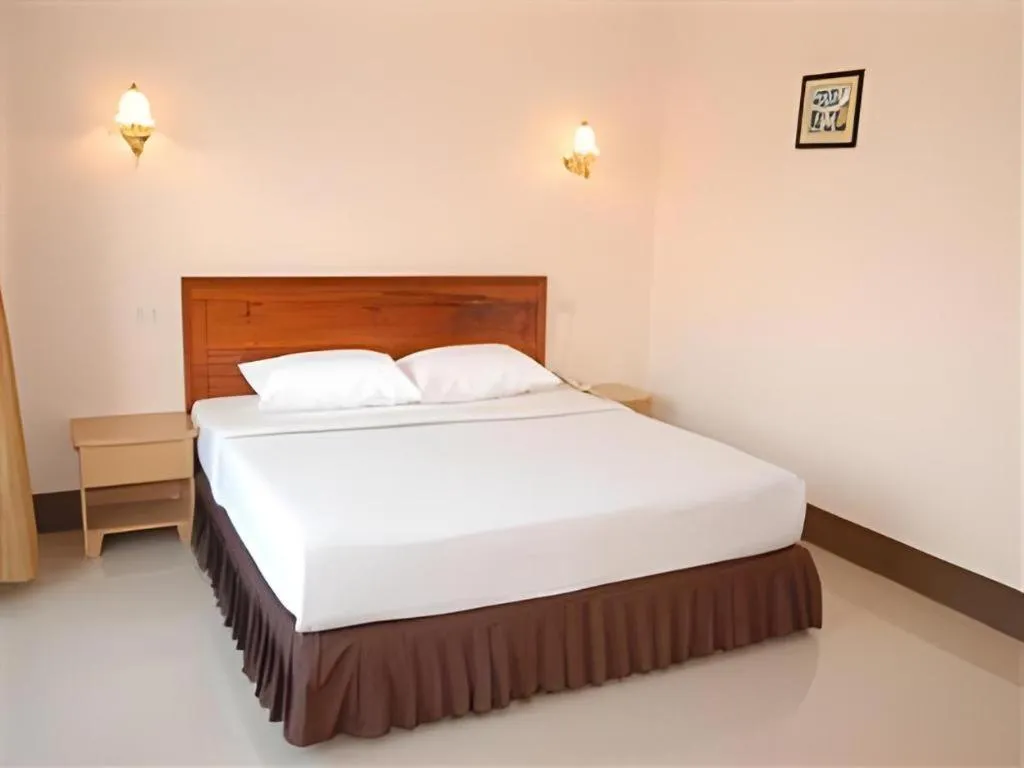 Bed in Chaleunehoung Hotel