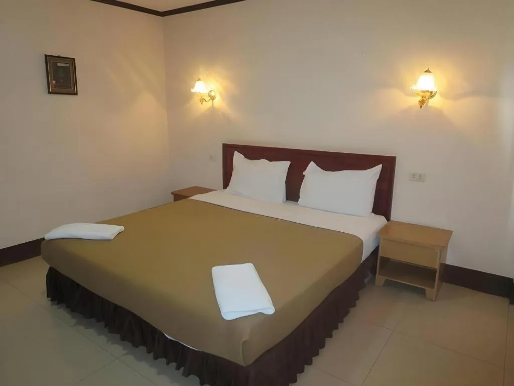 Bed in Chaleunehoung Hotel