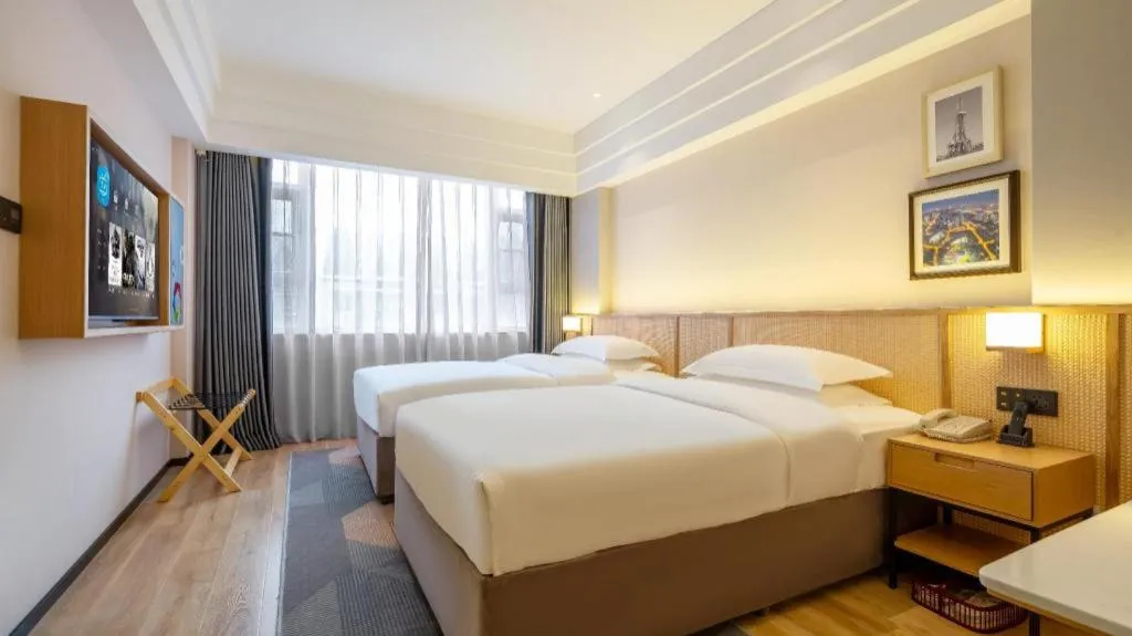 Bed in Gem Flower Jinyu Sunshine Hotel