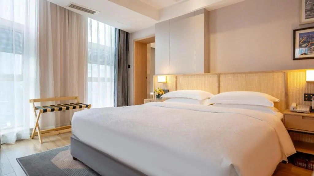 Bed in Gem Flower Jinyu Sunshine Hotel