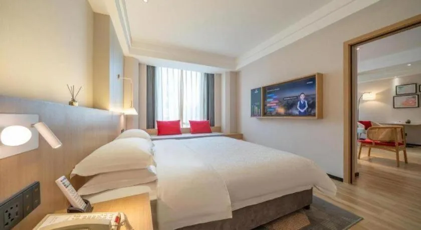 Bed in Gem Flower Jinyu Sunshine Hotel