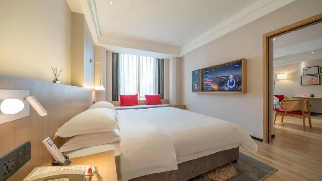 Bed in Gem Flower Jinyu Sunshine Hotel