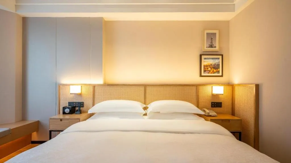 Bed in Gem Flower Jinyu Sunshine Hotel