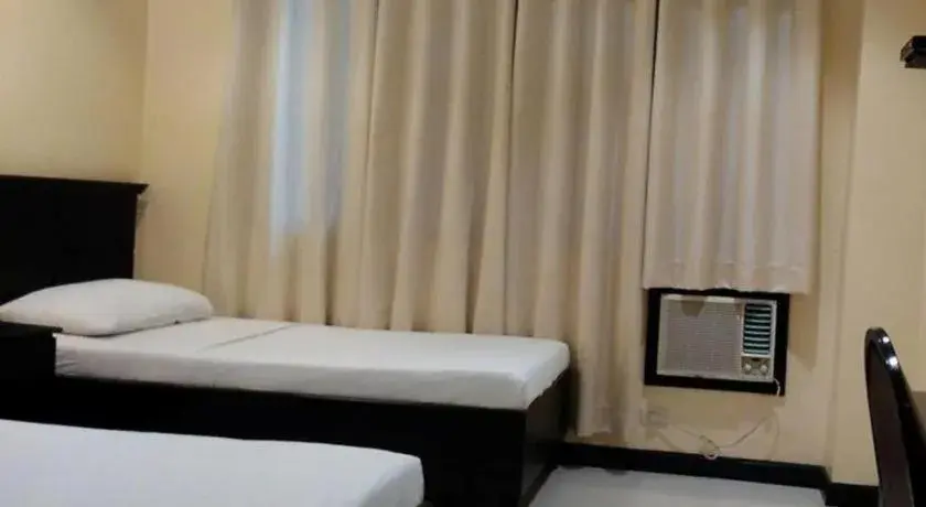 Bed in People's Hotel Bed in People's Hotel