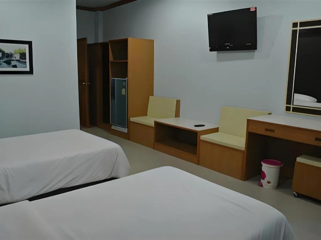 Bed in Baan Ingna Resort Hotel