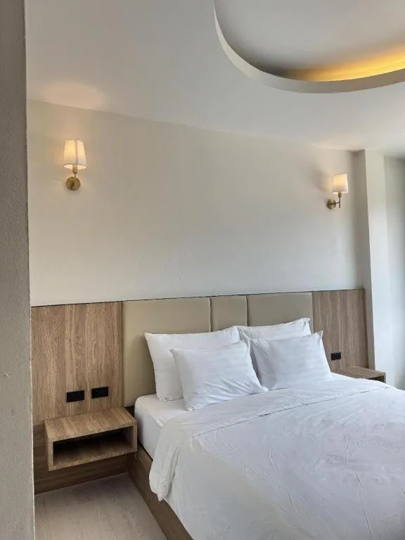 Bed in Baan Ingna Resort Hotel