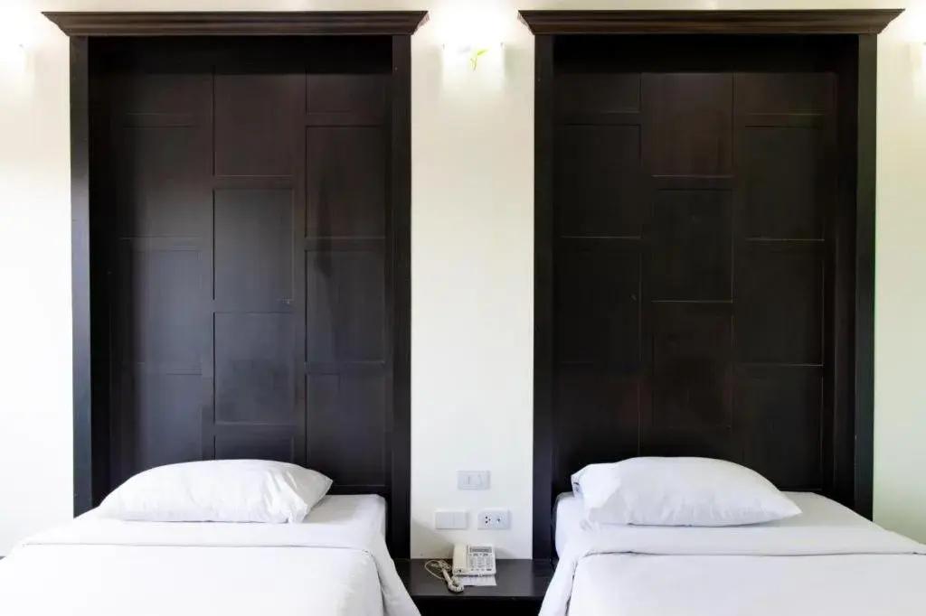 Bed in Baan Ingna Resort Hotel Bed in Baan Ingna Resort Hotel