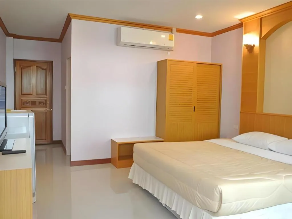 Bed in Baan Ingna Resort Hotel