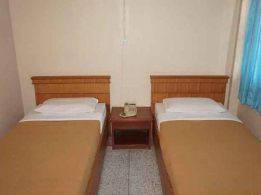 Bed in Supak Hotel